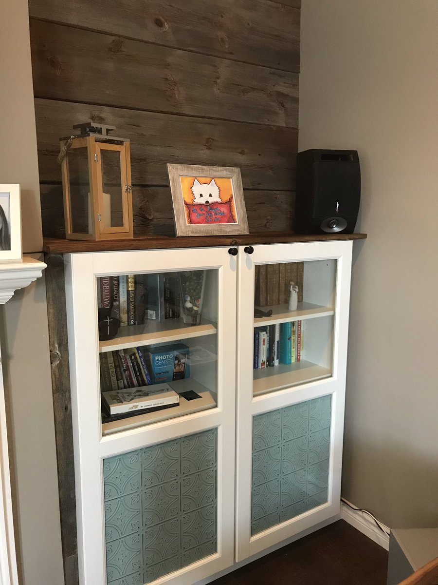 From bookshelf to built in!  My first construction job of the summer!  The tin ceiling tiles and 100 year old barn board were the inspiration!  Thanks <a href="/briangreer1/">Greer's Tin Ceilings</a>