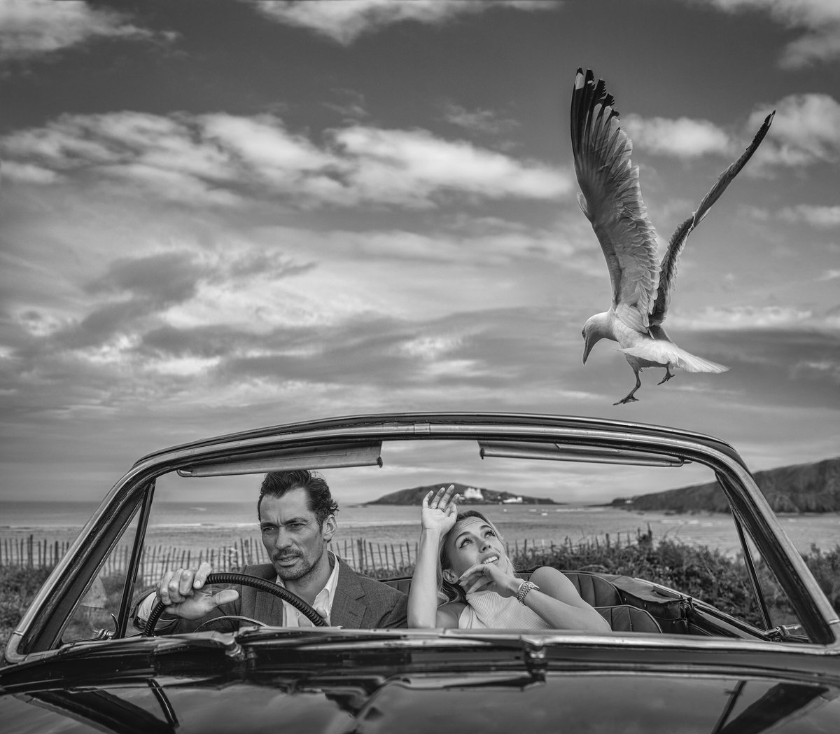 David_Yarrow's tweet image. Bodega Bay⁣
⁣
The second from my series that is a play on Hitchcock’s masterpiece - The Birds. The photograph places British models David Gandy and Bella di Lorenzo in a banged up 1961 Sunbeam Rapier with the Atlantic Ocean as the backdrop.