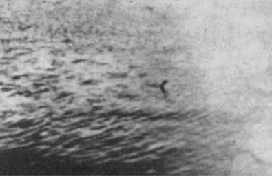 Going back to the Wilson photo, there’s a 2nd photo, which supposedly shows the object submerging. It’s pretty poor and has rarely been reproduced, and it wasn’t published until 1957 when Constance Whyte included it in her highly influential book More Than a Legend…