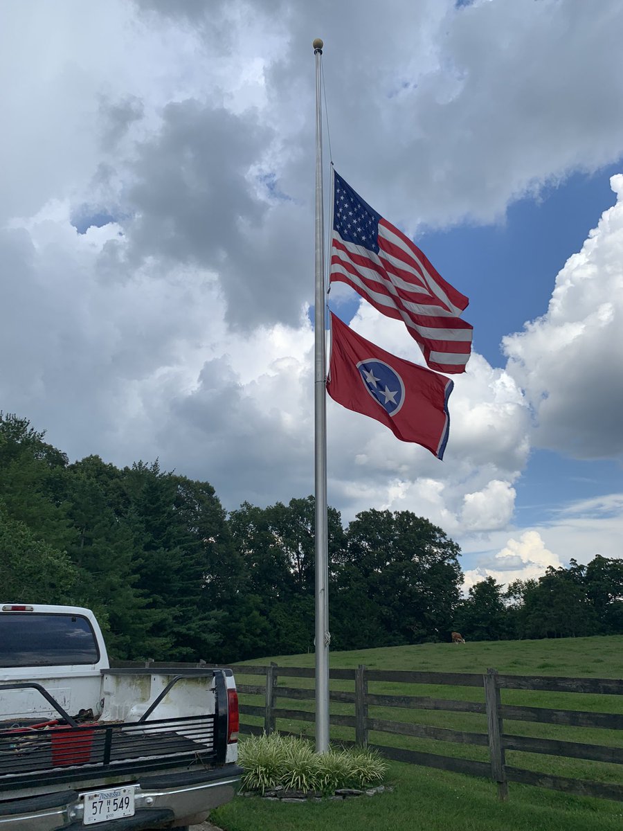 The TN flag & Old Glory at half mast at Charlie’s Twin Pines Ranch. TeamCDB/BW