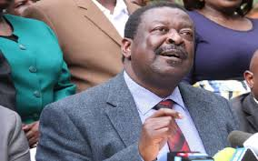 13/Example 2In early 2002, Michael Alan, “Africa sales manager” for US-based Spacenet, presented Postmaster Gen. Francis Chahonyo with a proposal to install a satellite system linking all post offices. Chahonyo took it to the Min for Transport and Telecoms, Musalia Mudavadi.