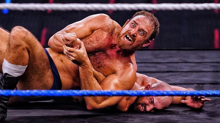 WrestlingAccess's tweet photo. It was gritty, but in the end, #TimothyThatcher made @wwestardestroyer submit! https://t.co/xvTfvuRfZ6