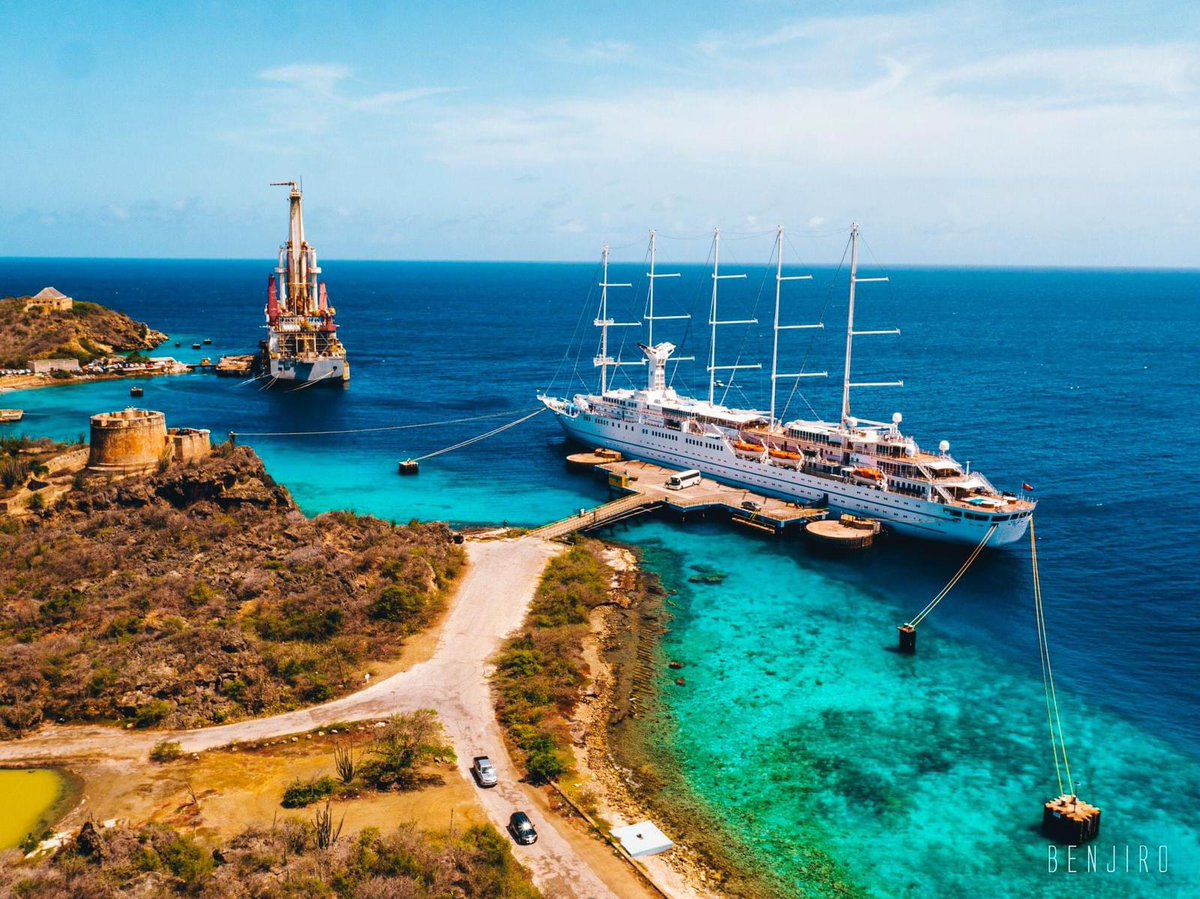 WindstarCruises's tweet photo. Wind Surf moored in Curacao. 

#smallshipcruise #windstarcruises #sailingship #curacao https://t.co/DXgj2nMdGW