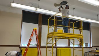 pvdschools's tweet photo. Many high school classrooms, like this one at Mt. Pleasant High School, are getting necessary repairs gearing up for the start of school. Aramark crews are working to address ceiling problem areas to ensure safe, clean, and dry classrooms. #PPSDfall2020 https://t.co/qVLQ7bZPKM