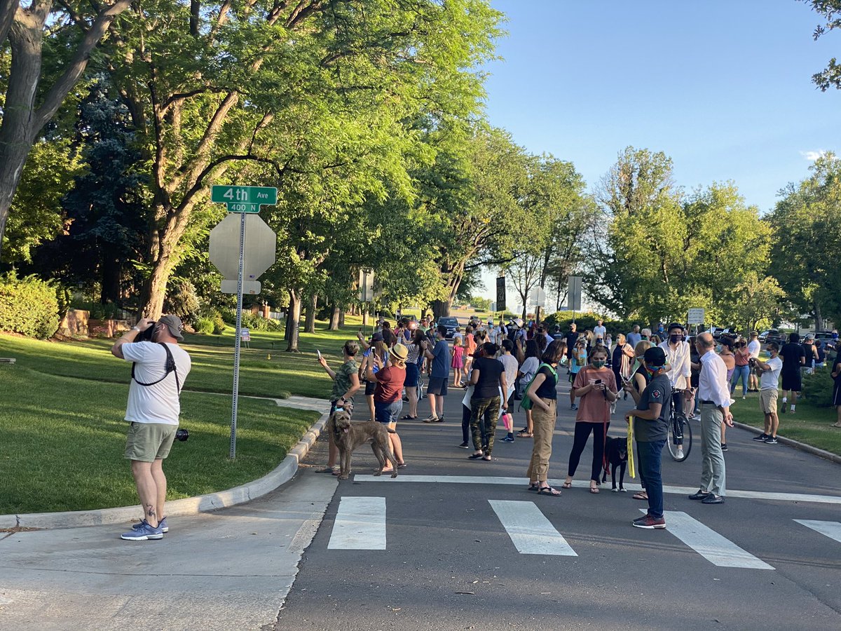 Jordan_Chavez's tweet image. A different kind of protest through Denver’s Hilltop neighborhood tonight.   A photo walk in solidarity with a man shown in video being told to leave for taking a picture of a house. #9NEWS