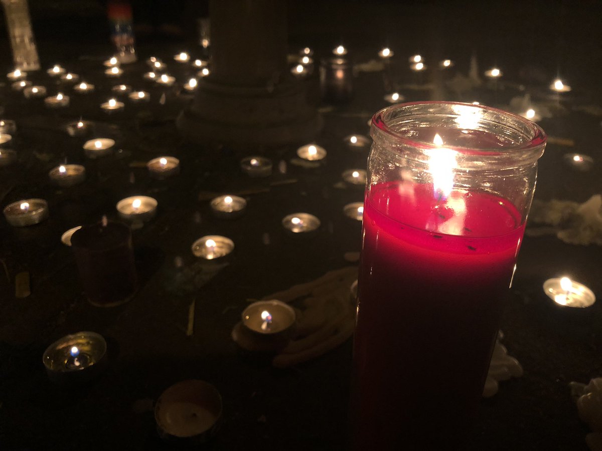 The group has split, around 100 folks have left and 100 are still in the park. Here’s the candles from the vigil and the stun grenades that were thrown a bit ago.