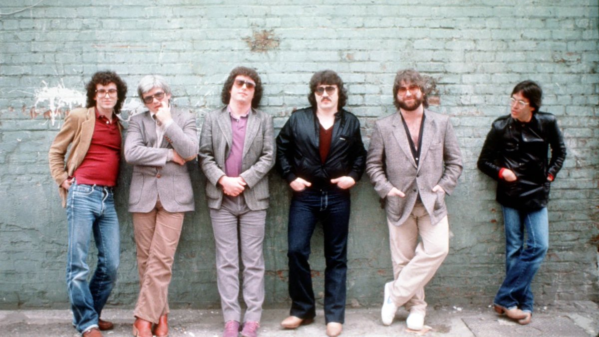 Super70sSports's tweet photo. I’m 97% sure the three dudes in the middle of this photo of Toto were the NWA six-man tag champs for a while in 1986. Tremendous feud with the Fabulous Freebirds as I recall. https://t.co/PpSnzGwfvG