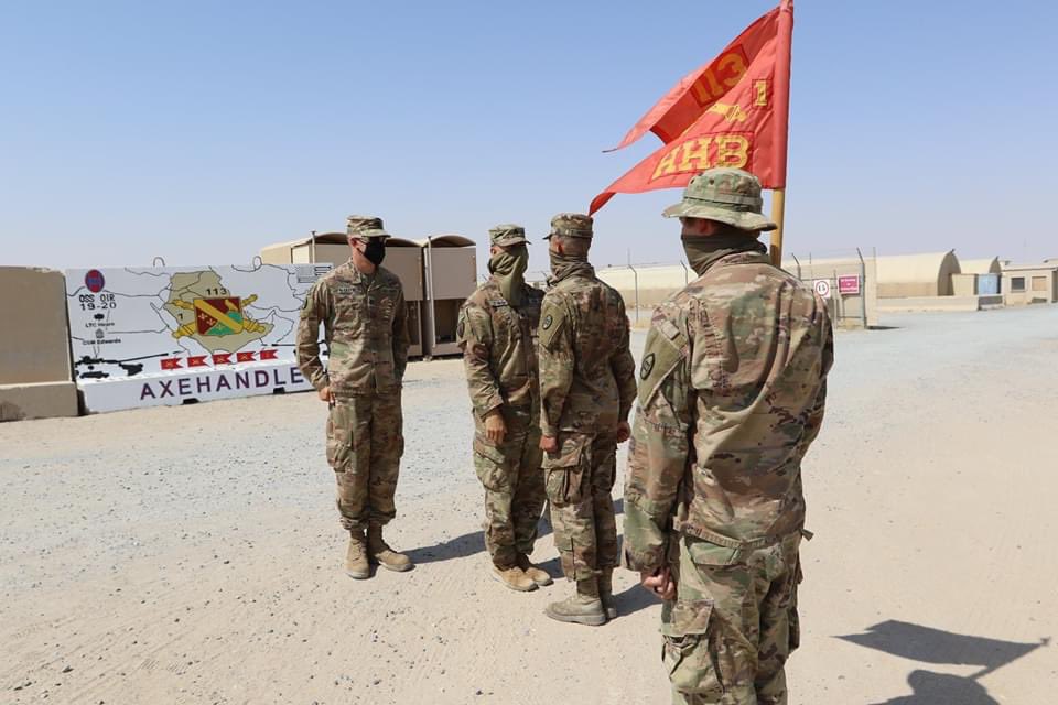 30thabct's tweet photo. U.S. Soldier, Spc. Dominik Walls, from the 1-113th Field Artillery Regiment, #30thabct receives a promotion in front of the 1-113th Field Artillery Regiment T-Wall he painted while deployed in the @CENTCOM area of responsibility for @TFSpartan July 7, 2020. https://t.co/0yk4LLPWhp
