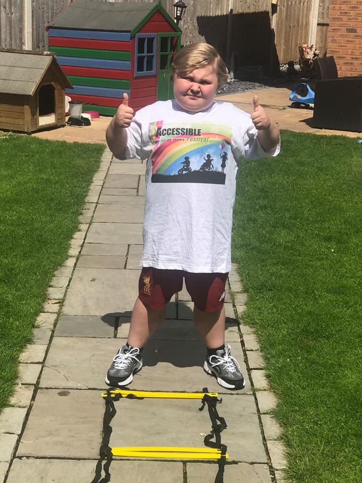 GRAB SOME MERCH WHILE YOU CAN!! 
Access Fest rainbow T-shirts available for a donation. Email accessfest@summerseatphysiotherapy.co.uk. Here’s one of our superstars Liam modelling his during his physio session.