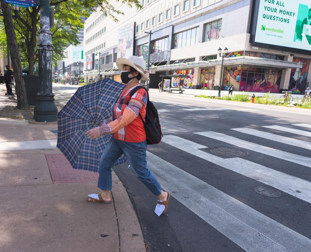 burstmode610's tweet photo. Woman protected from head to toe in these Philly streets #streetphotography #streetphotographer #photography #pandemiclife #streets #Philadelphia #Philly #mask #umbrella #lifestylephoto #urbanphotography https://t.co/0TsAkvwAy1