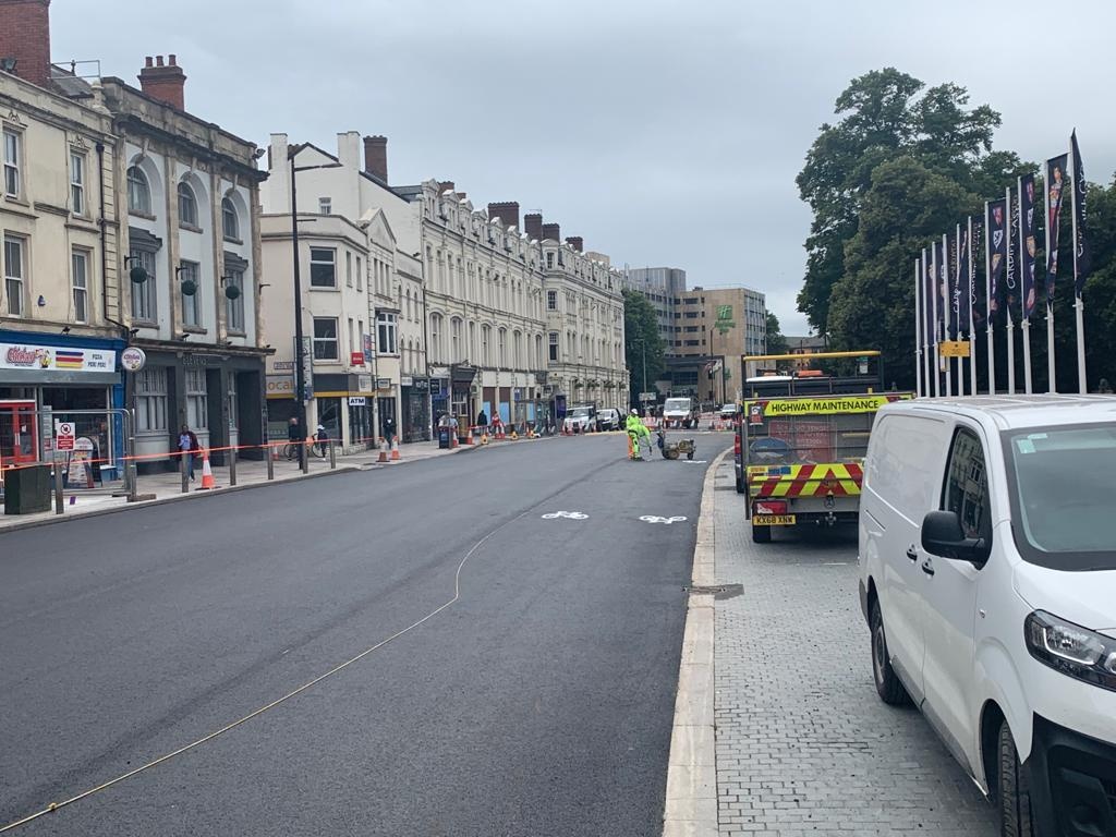 cardiffcouncil's tweet photo. Castle Street in the city centre has been re-surfaced so that both the street and the Castle moat can be transformed into a covered outside eating area for cafes and restaurants to use. Take a look at our before and after pics.  Find out more here: https://t.co/6B6KNNVmqM https://t.co/EB1Qopw7Z2
