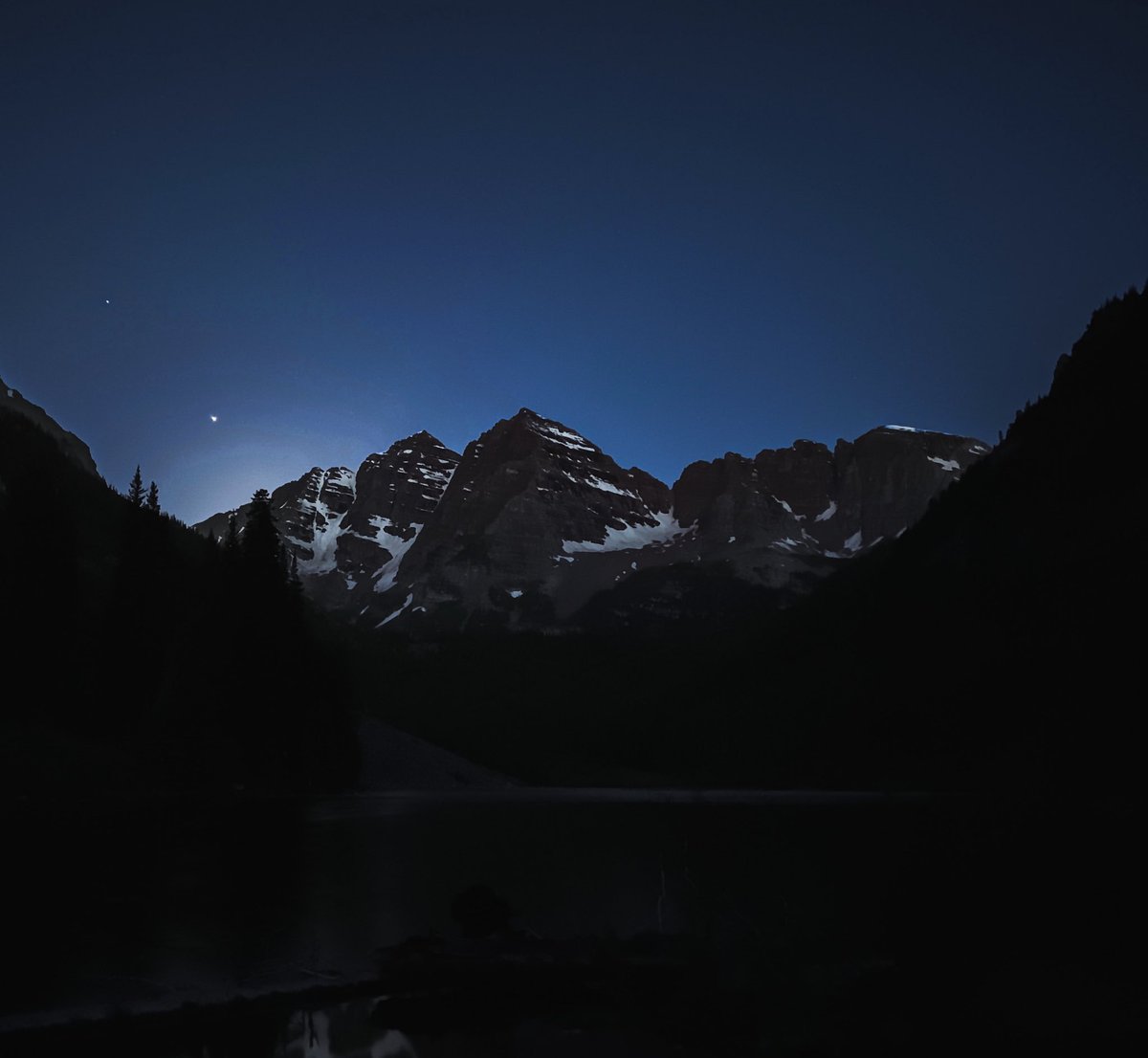 A dreamer is one who can only find his way by moonlight, and his punishment is that he sees the dawn before the rest of the world. ~ Oscar Wilde #Colorado #NaturePhotography #MaroonBells #StormHour #Moonlight