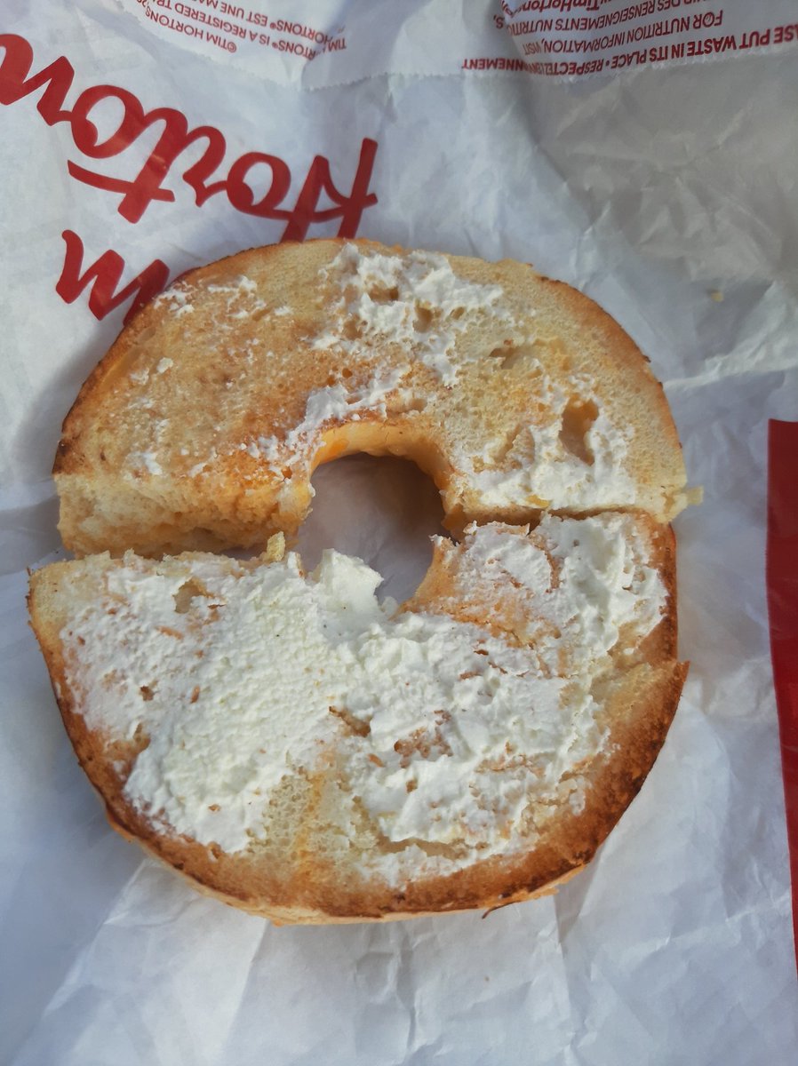 KBandiera's tweet photo. This is what @TimHortons does to my breakfast. You call this cream cheese bagels...they should be ashame of themselves. You call them and they blame some "new girl" meanwhile it's the same staff for the last how many months? @TimHortons Very disappointed in the way you handled it https://t.co/aPwveAfrY4