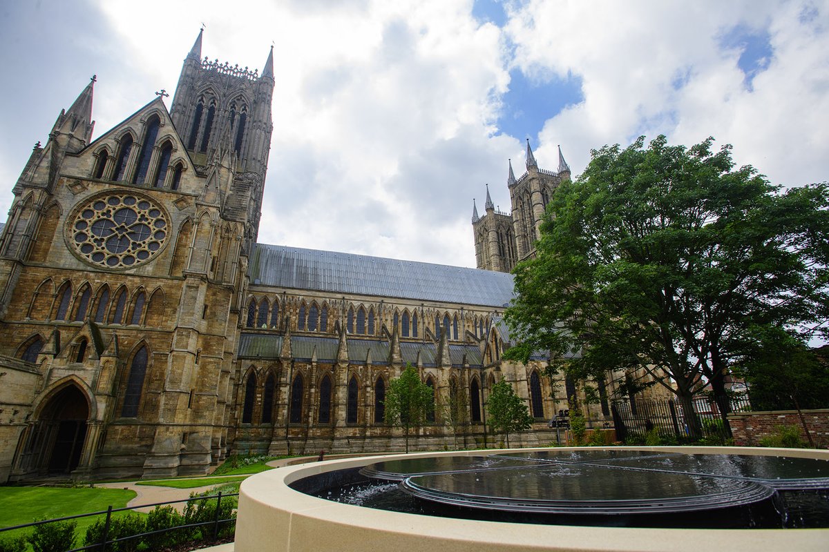 LincsCathedral's tweet photo. The Dean’s Green has been beautifully landscaped to create a peaceful space for all to enjoy (open 2021). We now have a majestic water feature made of stone and bronze with a hidden Lord Tennyson poem inscription. It's incredibly #peaceful to watch – Here's a #sneakpeek! https://t.co/JFcSM7t0nI