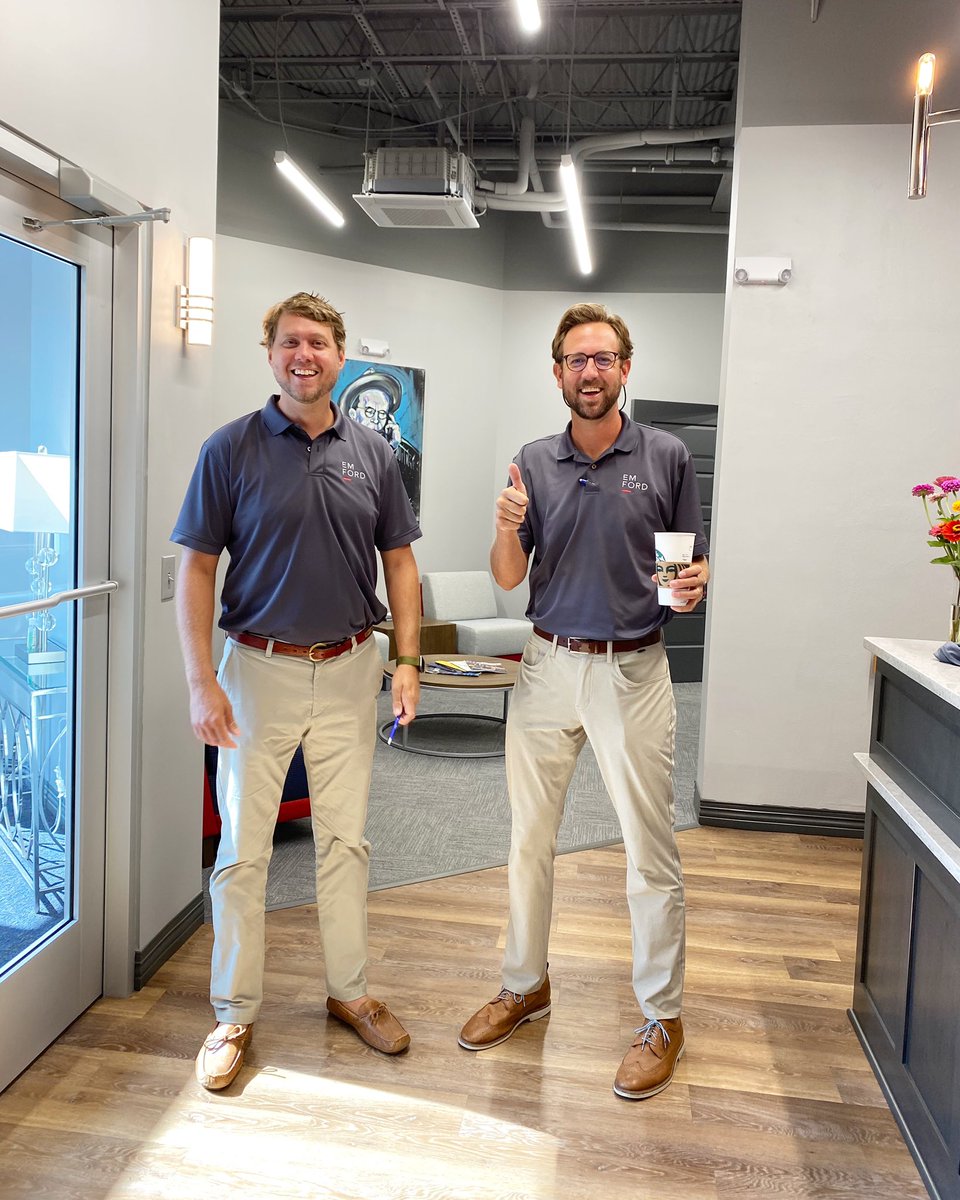 EMFord1925's tweet photo. The insurance fashion content you never expected. Reisz & Travis hit the road running today... in accidental matching outfits. Who wore it better? #TeamReisz or #TeamTravis? #emf1925 #emford #insurance #financialplanning https://t.co/436IZsM6ff