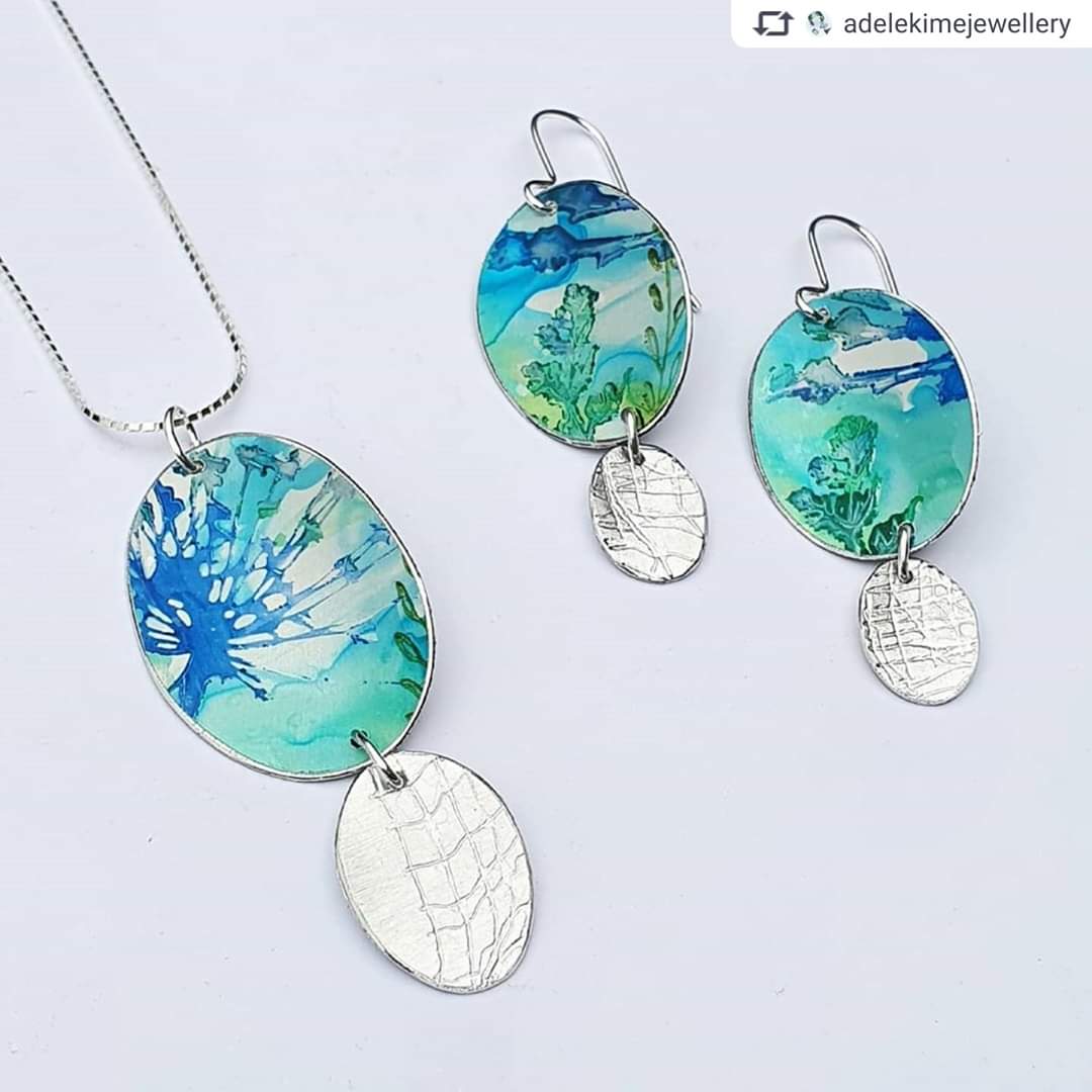 Adele Kime Contemporary Jewellery
<a href="/adelekime/">Adele Kime Jewellery</a>

"New necklace and earrings design in ovals coloured and silver textured drops. These move and catch the light when worn, really pleased with design. Hope you like them"
#newmillsfestivalarts #highpeakartists #necklaceandearrings