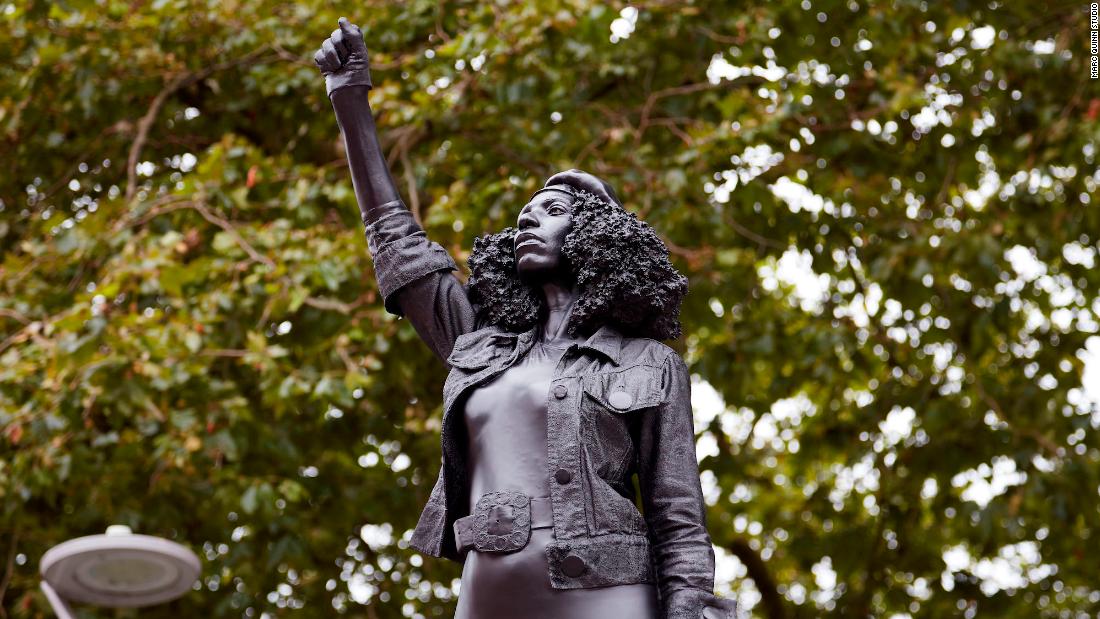 CNN's tweet photo. A sculpture of a Black Lives Matter protester has replaced a slave trader statue in the UK.

The work is officially titled "A Surge of Power (Jen Reid) 2020" and depicts a woman with her fist raised in a Black Power salute. https://t.co/UwrBNFrXeo https://t.co/yWrLeqFwCZ