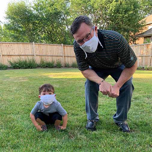thinkNSA's tweet photo. One size really does fit all, our Heartland Community masks with EZ FIT adjustable straps. NSA owner Chuck Grossman & NSA fan Dawson model these face coverings - both mask & materials are 100% #madeintheUSA-See here: https://t.co/e39F1mlJz3 #thinkNSA #family #COVID-19 #USAmade https://t.co/tYAXHPnN9R