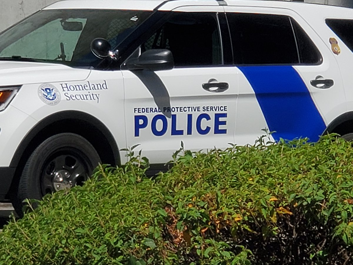 Indoorsness's tweet photo. #Federals in Seattle now. DHS units to defend the Federal building here. #seattleprotests Seen on foot patrol as well, standard dress blues and marked vehicles, not anonymous green men as seen in #portland last night (yet). https://t.co/y1A9ZVw1tR