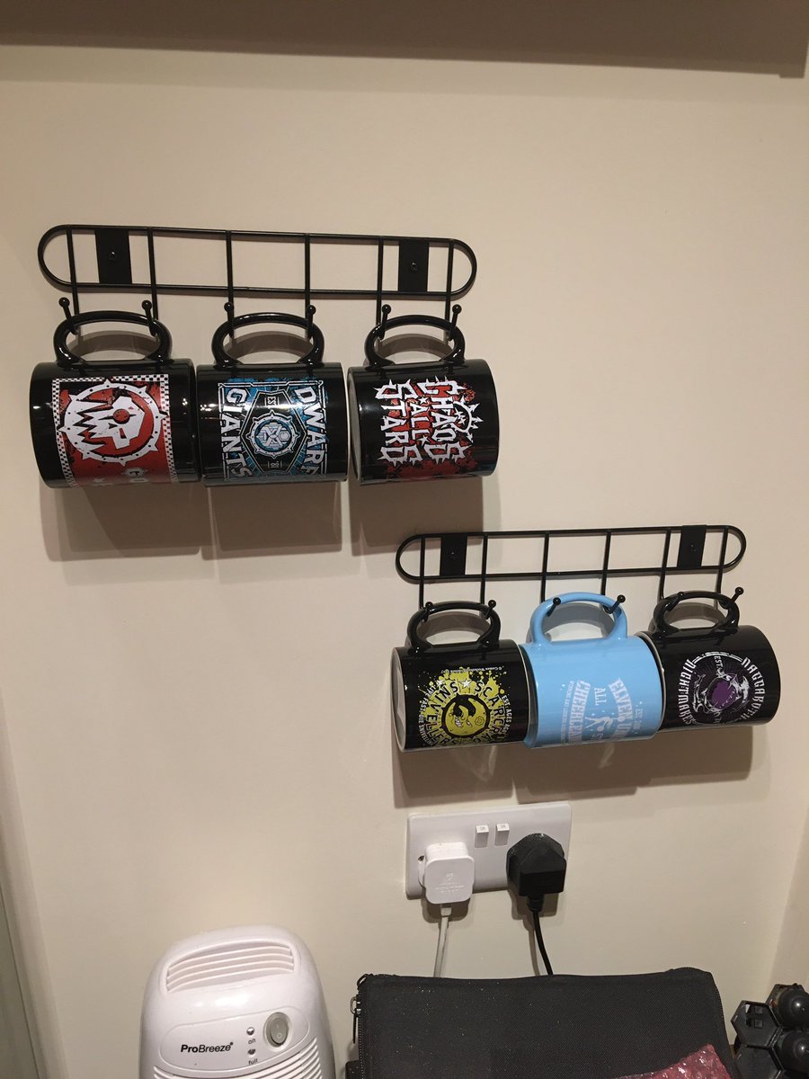 CharlieBanks88's tweet photo. Day 197 of #hobby2020 and I’ve made a massive balls up with my storage solution for my Blood Bowl mugs... Arse! So now I’m mounting the TV there to cover up the holes I’ve made and I’ll just get a mug tree 😂 #diydisaster #dangertomyself https://t.co/GjaBXPLj7U