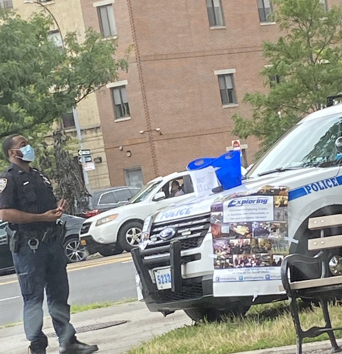 Cops selling dollar waters off a 49th precinct car at the corner of Pelham Pkwy/WPR yesterday.  #budgetcuts #NYPDExposed