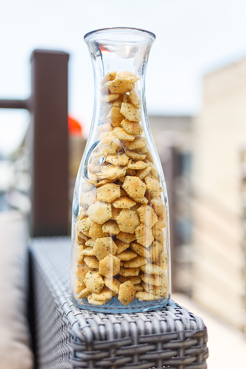 "Seasoned Oyster Crackers" are shaken in a bag with Hidden Valley powdered ranch seasoning, dill, and some oil. They are annoyingly addictive.