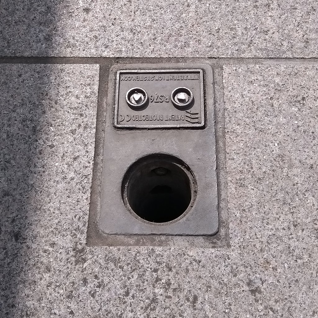 YellowdotKev's tweet image. The missing cover on this sign post plate has given it a fearful expression : ( From earlier in the year on the high street where I work, when I was working in the Yellowdot studio and not from home! #lockdownextension  #pareidolia #Texturehuntergather @LizAtkin