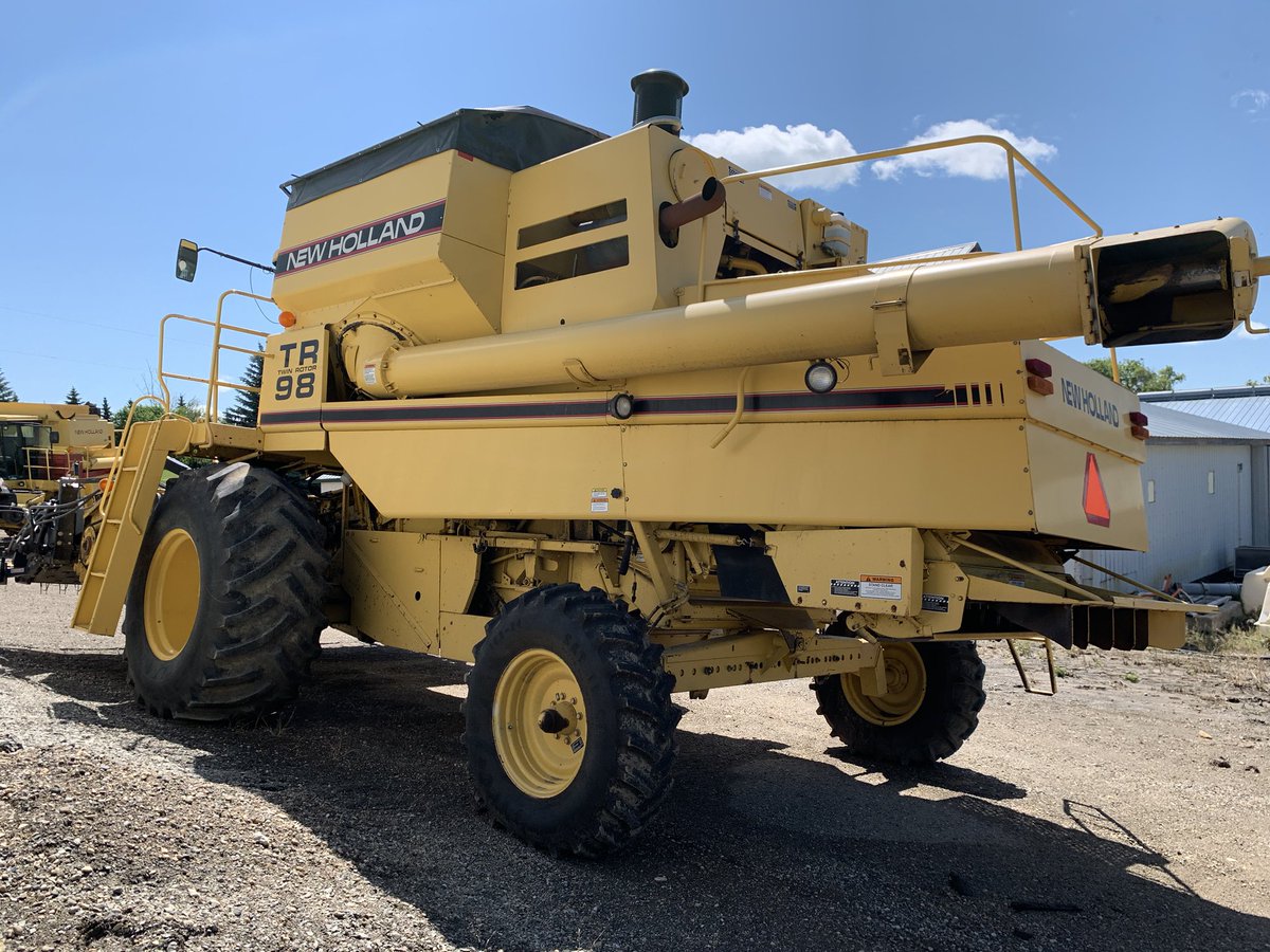 alexdevloo's tweet photo. 1997 New holland Tr98 2800 separator hours. Swathmaster pick up. Looking for $20000 obo  call text 204-208-0318  Tr96 sold https://t.co/x7bfukiiYm