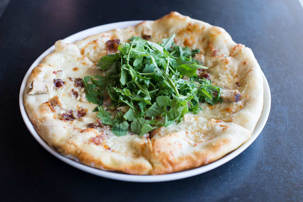 Dine in or curbside pick-up, this White Pizza is 😍