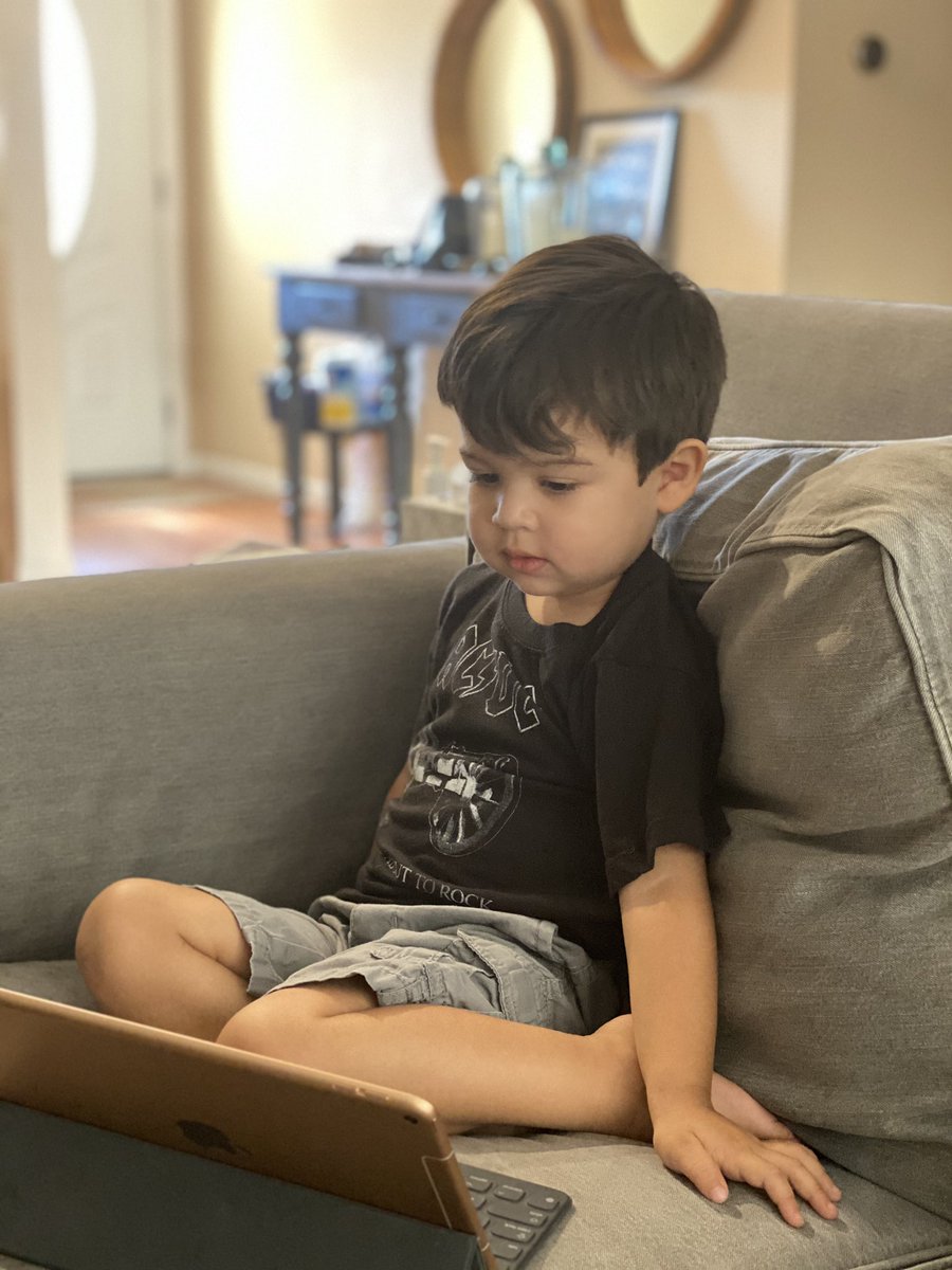 noramayc's tweet photo. This morning I was trying to get through email and a little human kept moving my @poppin standdesk up-and-down, up-and-down. So @EncantosBrands @CanticosWorld bilingual preschool app to the rescue. He was tapping with his toe 🙈🦶🏼#wfh #momsinvc https://t.co/hYPUlfi0L4