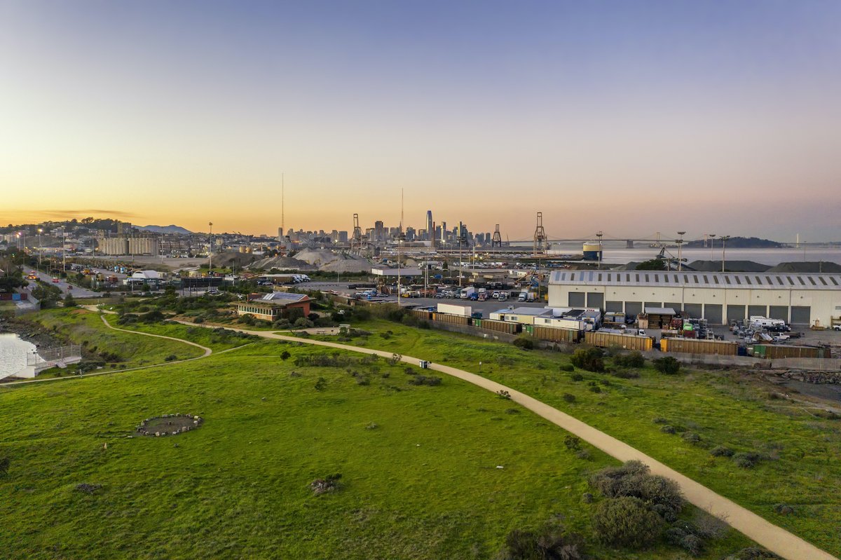 SFPort's tweet photo. Soothing sunset views from one of the Port’s many waterfront parks and open spaces. Take a deep breath – we’re all this in together! #WaterfrontatHome #LoveYourWaterfront https://t.co/aEDzhsUQxc
