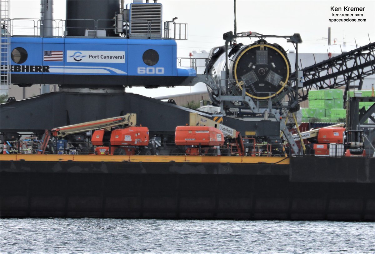 ken_kremer's tweet photo. With all legs retracted recovered #SpaceX #Falcon9 B1060.1 capped 1st stage from #GPSSV03 launch lowered horizontal and all work stopped @PortCanaveral-due to same atrocious weather that scrubbed todays planned noontime launch of next @SpaceX #Starlink from @NASAKennedy pad#39A https://t.co/IG7n6KV6a1