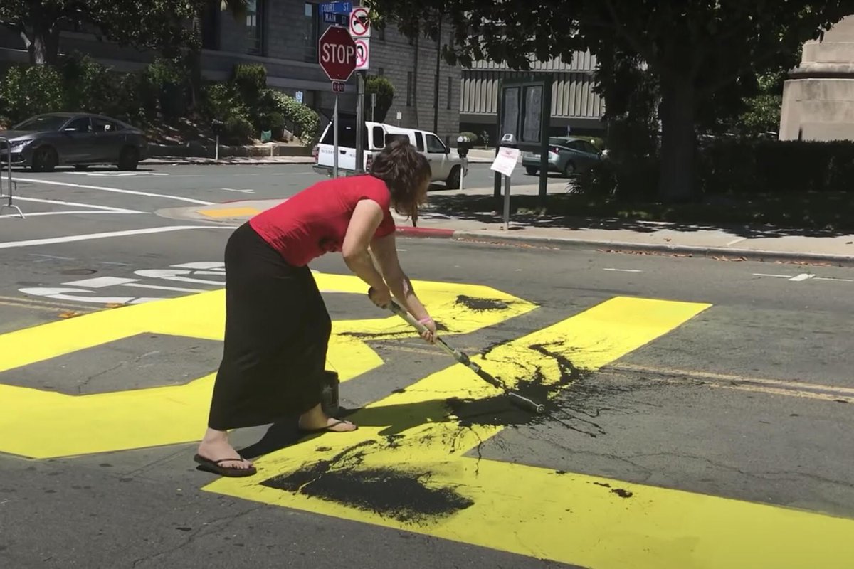 pocpodium's tweet photo. Trump supporters have been charged with hate crime for painting over #BLACKLIVESMATTER asphalt mural in CA. https://t.co/cRmVU0aZNy