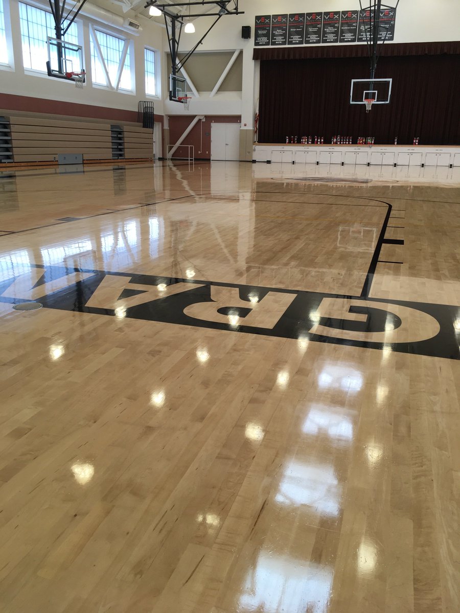 Custodial Department taking care of our gym floors!