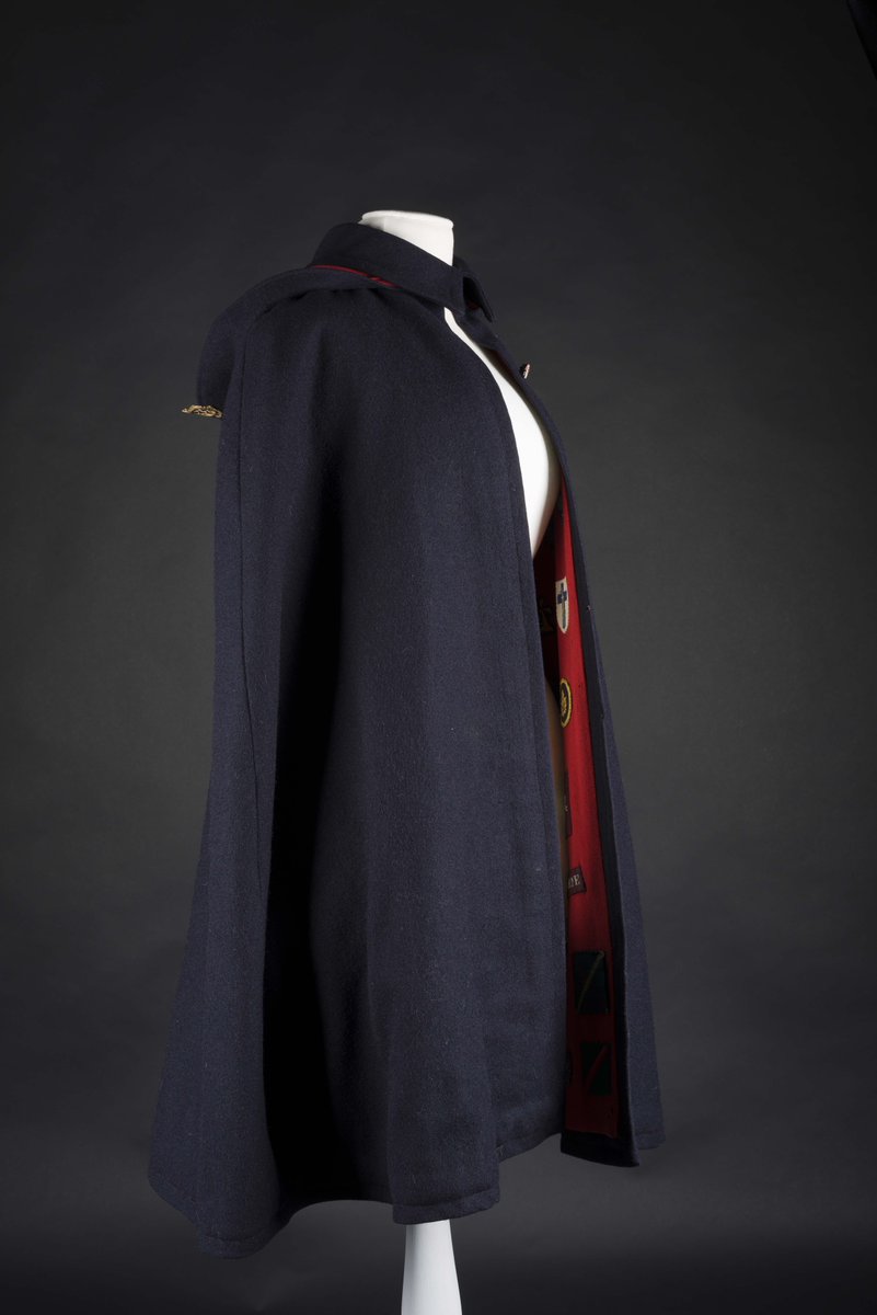 This incredible item belonged to Dorothy Smith, who worked as a Red Cross VAD nurse during the WWII. She worked in a military hospital and York in 1942 and then in Colchester from 1942-1946. Her uniform cape is decorated with badges given to her by the men she treated!