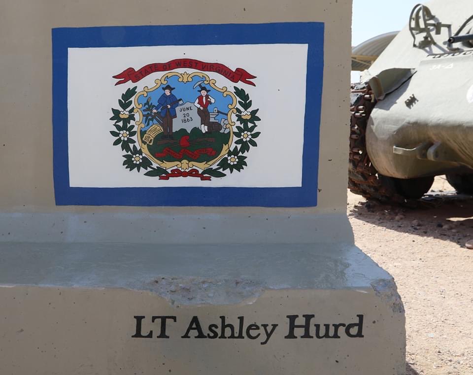 30thabct's tweet photo. U.S. Soldier, 2nd Lt. Ashley Hurd, a tank platoon leader attached to the 1-145 Armor Regiment, #30thabct, paints the second side of the #30thabct T-Wall marking the brigades legacy while deployed in the @CENTCOM area of responsibility for @TFSpartan, July 8, 2020. https://t.co/fUBfAX2zpV