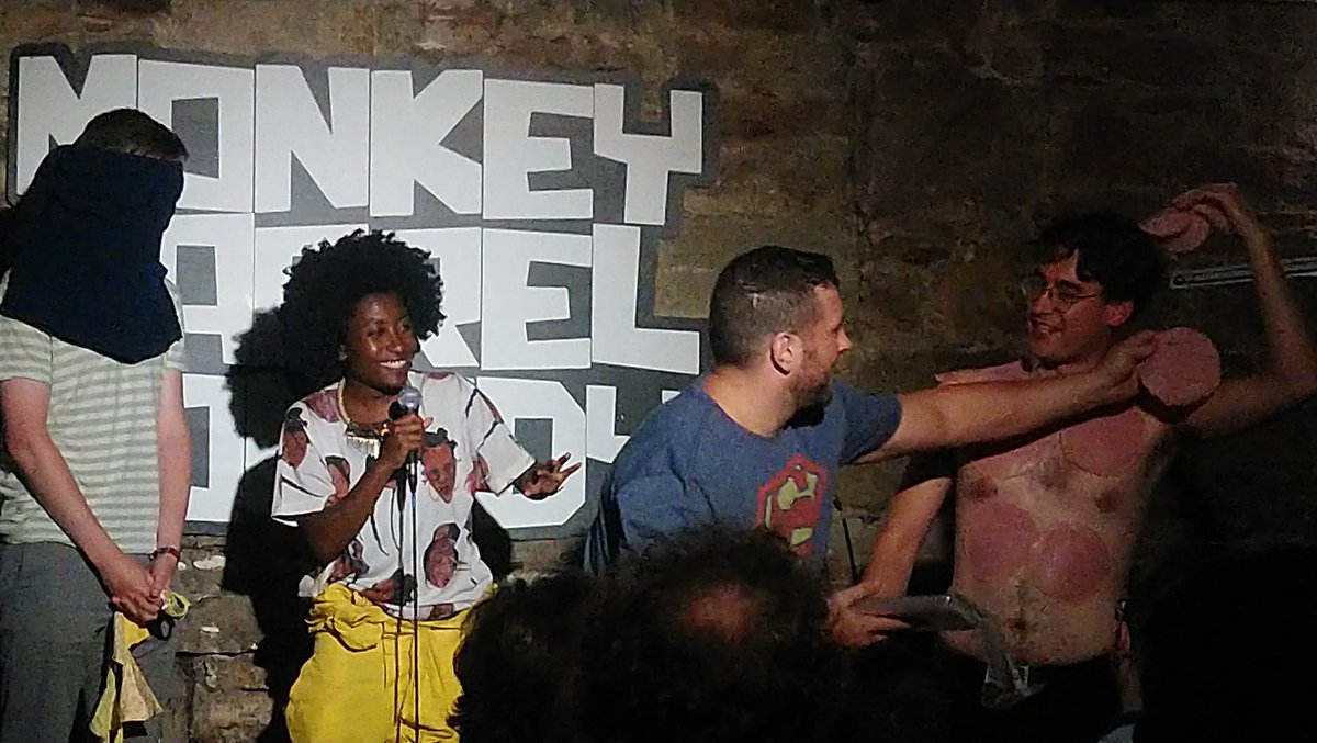 In 2018 I took three white men hostage. The first I blindfolded with his own clothing. I instructed a 2nd to cover the third's naked torso with ham slices. In 2019 I was nominated for Best Newcomer at the <a href="/ComedyAwards/">Edinburgh Comedy Awards</a> 

#SaveLiveComedy &amp; fucking sign at savelivecomedy.co.uk