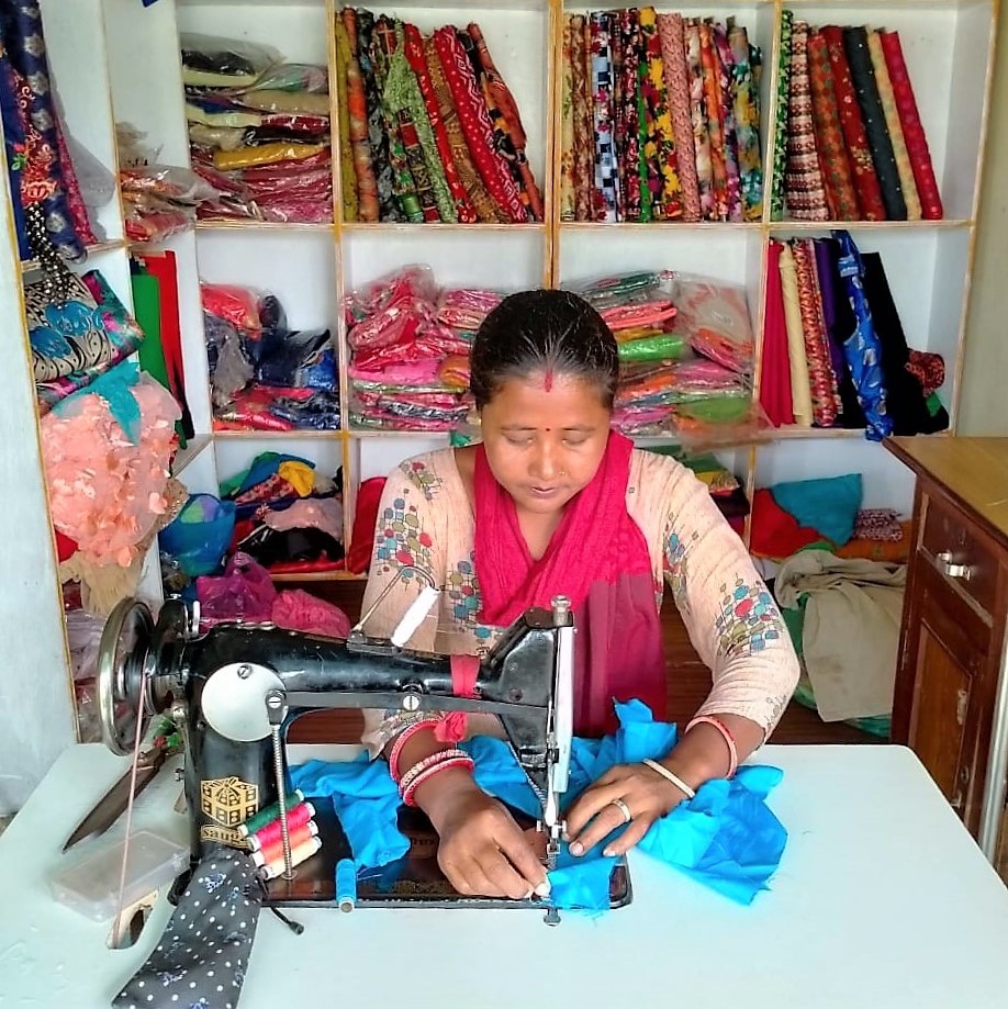 unwomennepal's tweet photo. Anita Kumari, a seamstress from Rautahat - Province 2 of Nepal, is working as a responder within the context of COVID-19. She is catering to the needs of her community by sewing masks. Read her story ➡️➡️ https://t.co/prygGkMyFt https://t.co/94QU2M1WEJ