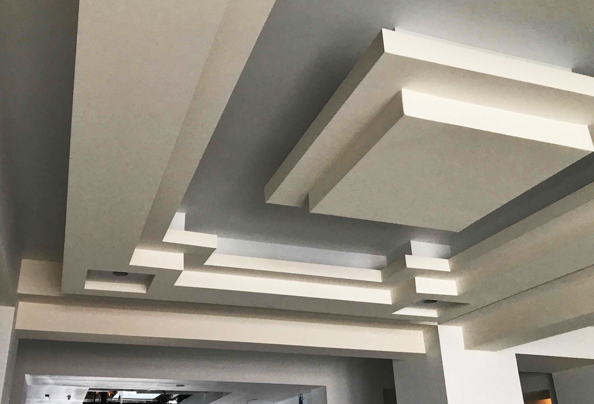 Check out the ornate ceiling in our main lobby. Even though it's waiting for some paint, inset lighting, and custom chandeliers before it's finished, we think it's looking really sharp!