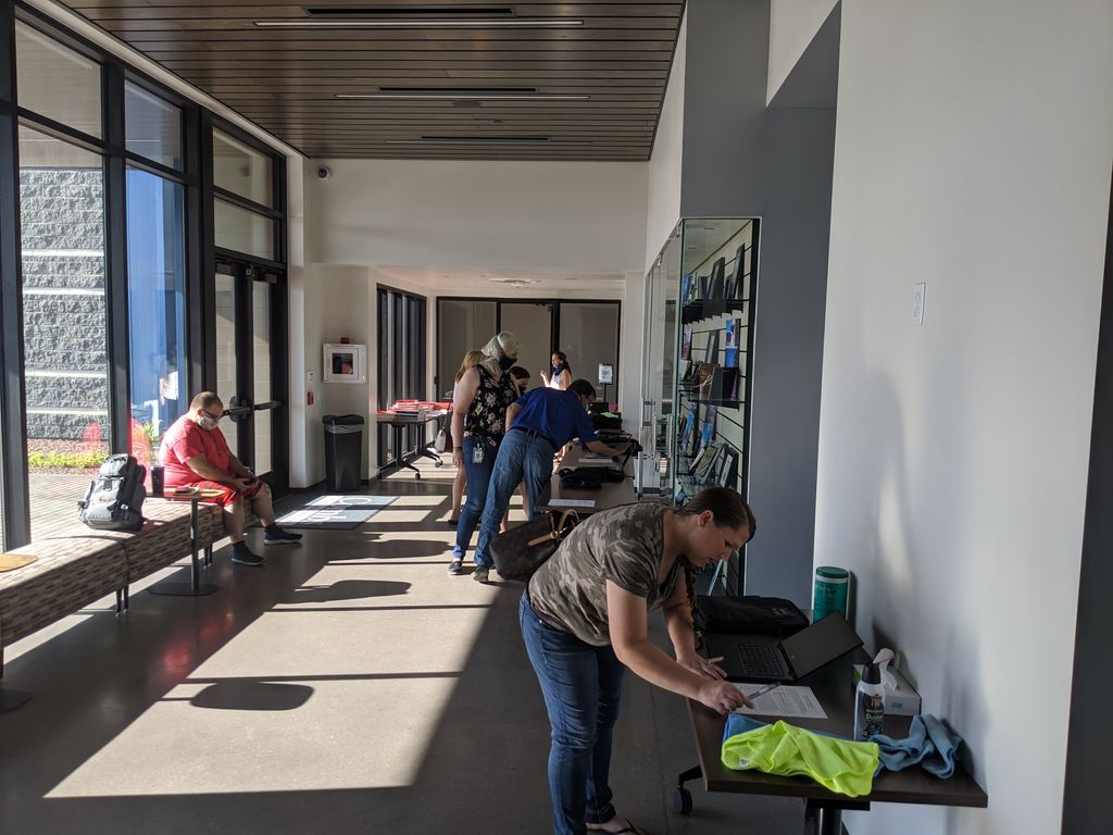 Handing out computers to our new teachers.  Exiting time, even as we work through a safe and healthy reopening if school.  Virtual boot camp starts virtually.  Welcome to J. O. Combs.  #CombsCares. #ChooseCombs