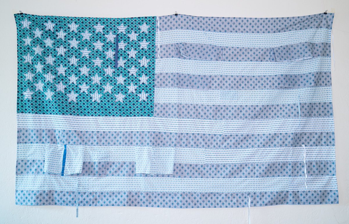 American flag made out of hospital gowns. #COVID__19 

lalegeorgia.net