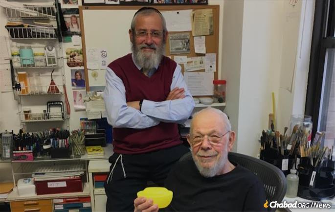 Rabbi David Masinter with Al Jaffee, years after they met.