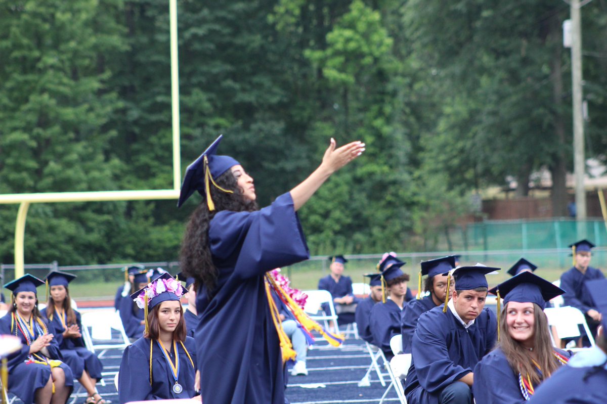 ColoniaHigh's tweet photo. As the graduate’s name was called, they stood instead of getting their diploma cover. Seniors cheered for one another as each graduate was recognized #ClassOf2020 #Graduation2020 #coloniapride https://t.co/1CKCZMcTPg