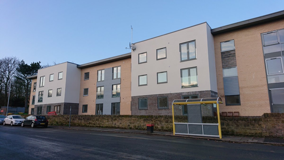 K1 white apartment block