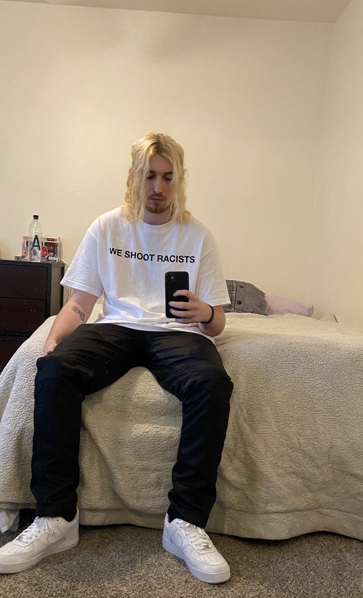 vetementsjeans's tweet photo. just got fired because a customer filed a complaint because the shirt i wore made them feel threatened https://t.co/uoJmvh0tSy