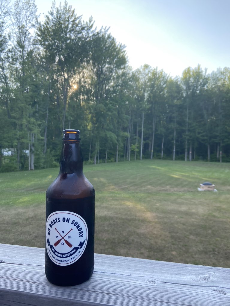 MachoDadness's tweet photo. The only time today where you can sit out on the deck, but I’ll take it! Plus it helps when you’ve got a tasty cider! #oarsup https://t.co/9dOsCGKJgI