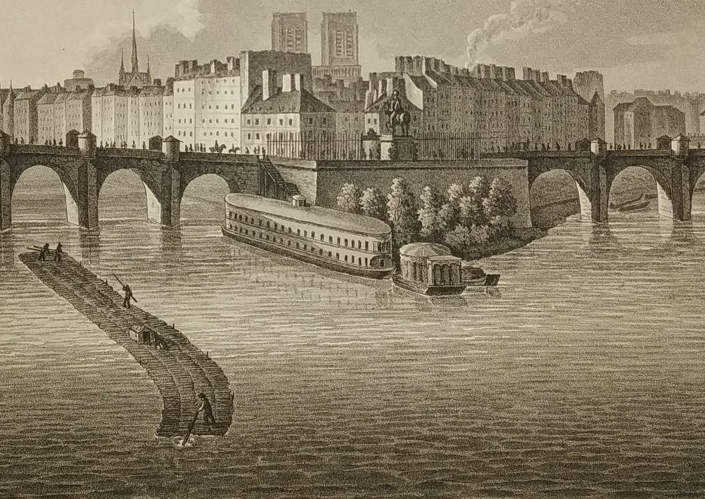 PS : les longs bâtiments flottants à la pointe de l'île sont un des bateaux de bains chauds de l'entreprise Poitevin autorisée par la Ville en 1784. En 1814, elle avait été reprise par Vigier qui gérait plusieurs établissements le long de la Seine  