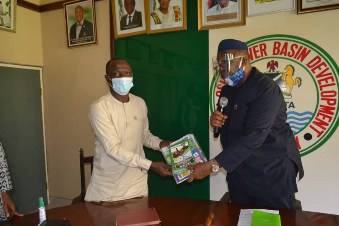 Visit of the Hon. Commissioner for Special Duties &amp; Inter Governmental  Affairs to O-ORBDA on the directive of His Excellency, Governor Dapo Abiodun,MFR. MD/CEO, Olufemi Odumosu presenting the Authority's Brochure /Journal to the Commissioner, Barrister Olufemi Ogunbanwo.