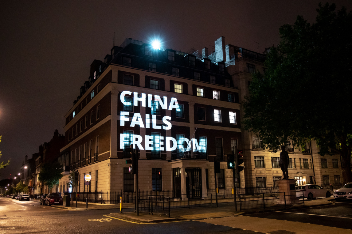 hkfp's tweet photo. 1/2 On Friday, Free Tibet activists projected protest messages on China's UK embassy, spotlighting Beijing's treatment of Tibetans, Uyghurs, Chinese and now Hongkongers. Photos: @freetibetorg. https://t.co/S6yJY7BKJe