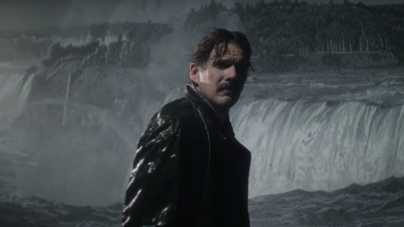 IndieWire's tweet photo. #Tesla Trailer: Ethan Hawke, Kyle MacLachlan Face Off as Nikola Tesla and Thomas Edison https://t.co/Q13UF9jXMq https://t.co/uXmmitwEkm